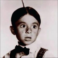 Hair section sticking up in a distinctive cowlick