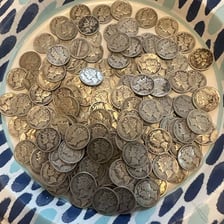 A pile of coins gathered together.