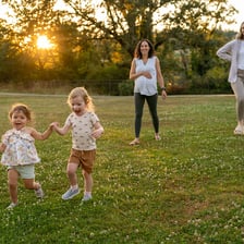 Children playing together during a scheduled playdate