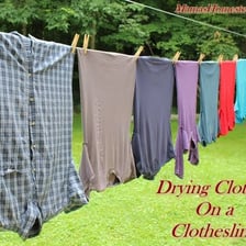 Clean laundry hanging from an outdoor clothesline.