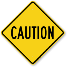 Visible warning signs conveying caution and advising people to take care.