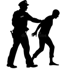 A police officer taking a suspect into custody.