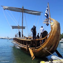 A reconstruction of an ancient Greek trireme with multiple banks of oars.
