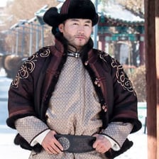 Mongolian people in traditional clothing in or near Ulaanbaatar.