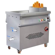 A deep fryer containing hot oil for cooking food
