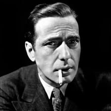 A portrait of actor Humphrey Bogart from his classic Hollywood career.