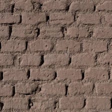 Adobe bricks made from clay-rich earthen material