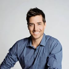 Jonny Moseley performing a freestyle skiing maneuver