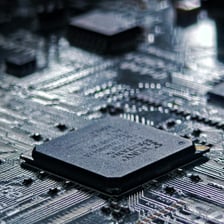 Close-up view of electrical circuitry and components on a computer motherboard