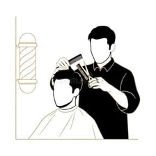 A stylist cutting a person’s long hair with scissors