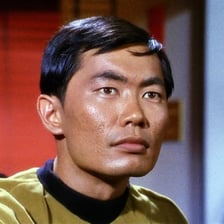 Hikaru Sulu in a Star Trek uniform