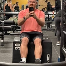 A person building strength through weight training