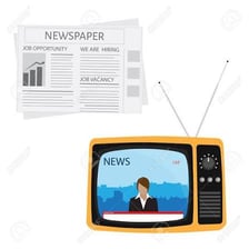 A newspaper displayed beside a television showing a news broadcast