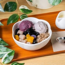 A serving of jelly and ice cream as a dessert.