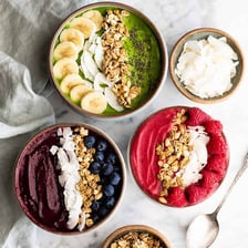 A bowl containing several ingredients combined into a mixture.