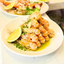 Several types of prawns displayed as seafood