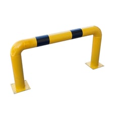 A protective barrier serving as a safeguard around machinery.