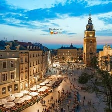 A historic town square with open space for market stalls.