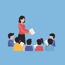 A teacher passing information to a student