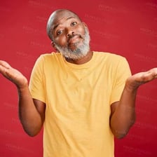 A person shrugging to express uncertainty