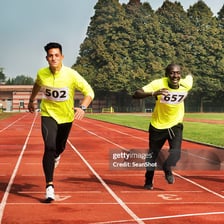 Two competitors racing toward the finish.