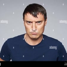 A person making an intense, unpleasantly suggestive stare