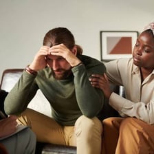 A person discussing worries with a counsellor.