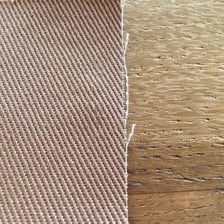 A close view of khaki chino fabric showing its twill weave