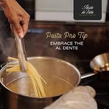 A fork holding pasta cooked al dente