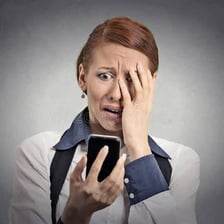 A person visibly reacting with offence or indignation