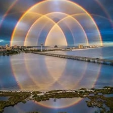 A rare-looking double rainbow across the sky.