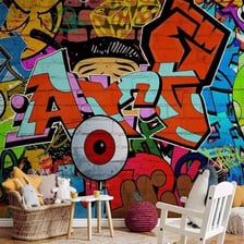 A colourful graffiti mural painted on a brick wall.
