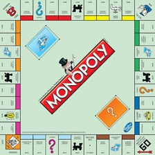A classic Monopoly board with playing pieces and property cards