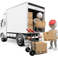 Workers unloading cargo from a truck.