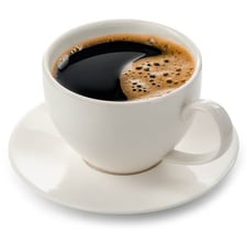 A steaming cup of coffee prepared without caffeine