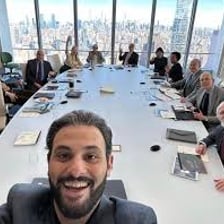 Company directors gathered around a conference table