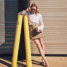 A person wearing fashionable contemporary street clothing