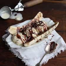 A banana split dessert with ice cream and toppings