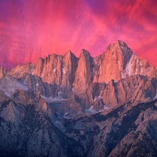 A mountain range with a prominent highest peak.