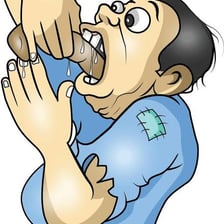 A person eating a large meal with evident eagerness