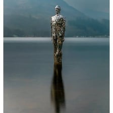 A stationary statue illustrating the meaning of motionless.
