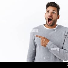 A person reacting with an open mouth to something astonishing