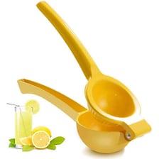 A handheld lemon squeezer being used to extract juice.