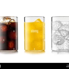 Glasses of cola and lemonade with visible carbonation bubbles