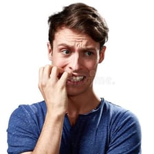 A visibly worried and unsettled person