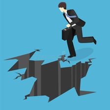 An illustration of someone blocking another person’s progress