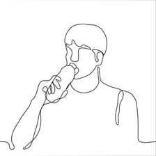 A person drinking a beverage quickly