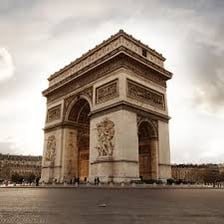 The Arc de Triomphe standing at the centre of Paris.