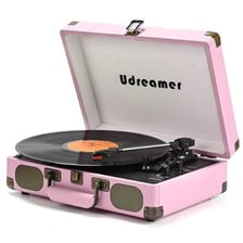A turntable playing a vinyl record.