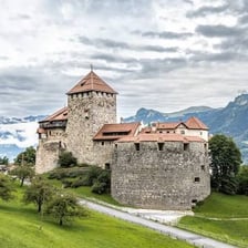 A mountainous Liechtenstein landscape with Vaduz Castle.